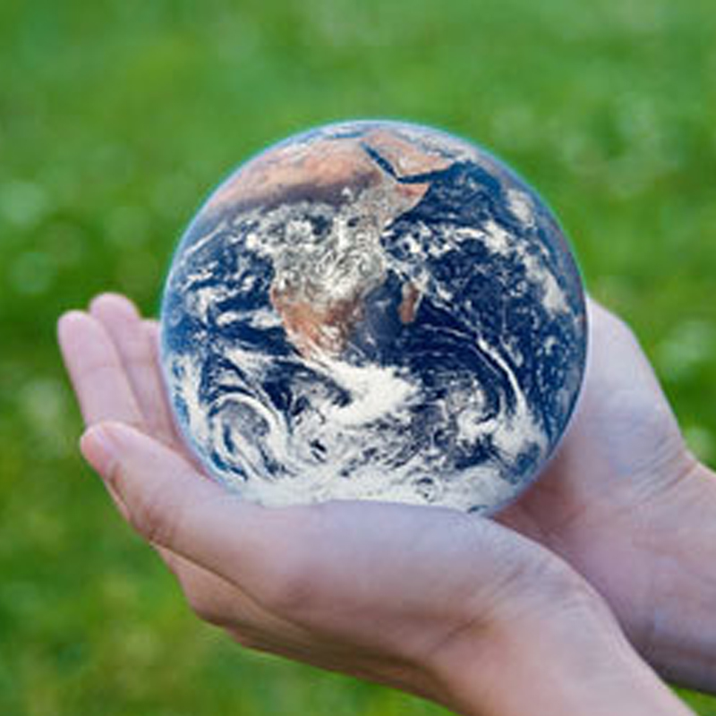 Earth held in human hands