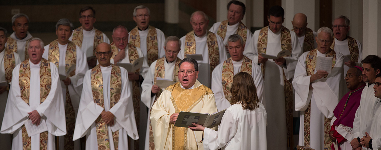Jesuits singing during mass.